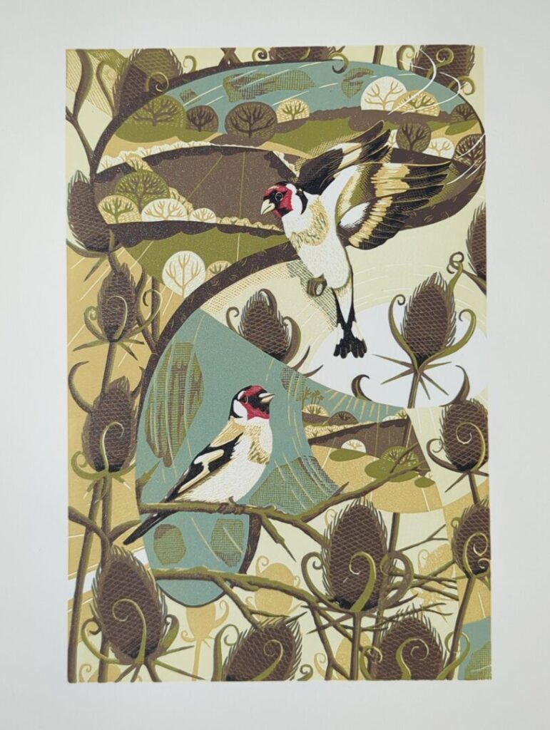 An illustration of two goldfinches among branches, leaves, and thistles. One bird is in flight, the other perched, both rendered with vibrant plumage. Earthy tones with touches of green and blue form a harmonious natural backdrop.