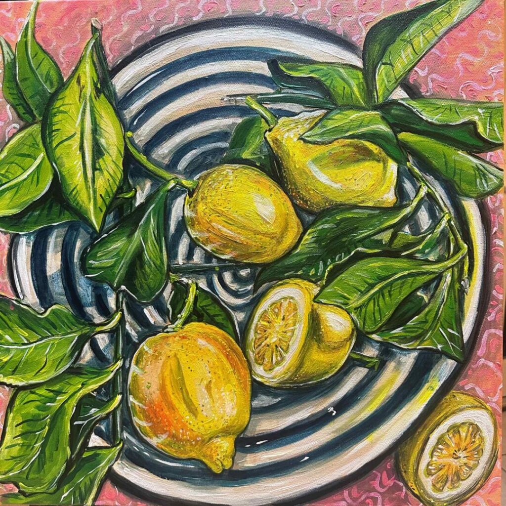 A vibrant painting of lemons and green leaves arranged on a black and white striped plate, set against a textured pink background. The composition includes whole and halved lemons, creating a fresh and lively still life.